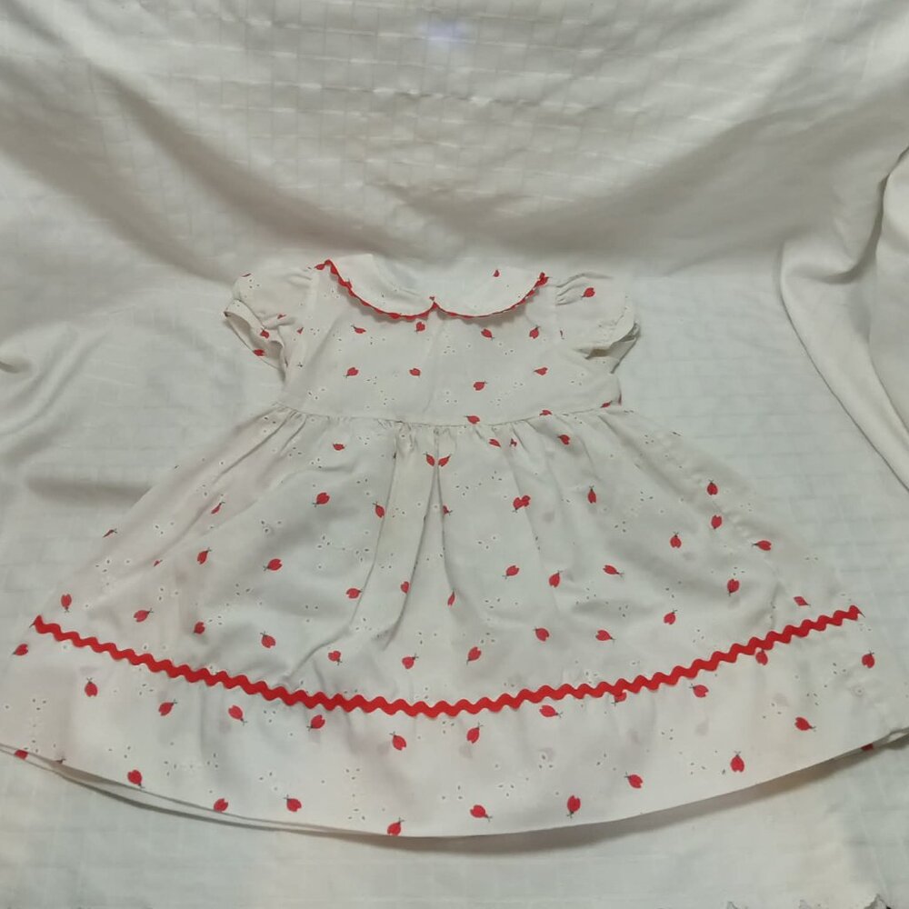 Pretty vintage dress with English lace-style fabric featuring ladybug pattern